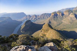 Blyde River Canyon with Three Rondawels peak, view of canyon with Blyde River and Table Mountains,