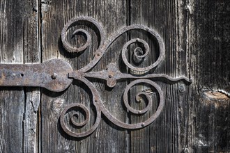 Old, hand-forged iron door fitting on a wooden gate, Ittingen Charterhouse, Warth-Weiningen near