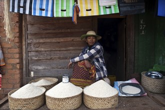 Woman selling rice (Ambalavao, Madagascar), She belongs to the Betsileo ethnic group