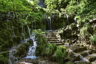 Waterfall at the Brühlbach stream in Bad Urach in the Swabian Alb, Baden-Württemberg, Germany,