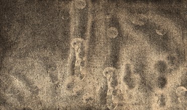 Abstract sepia image with grainy texture, featuring intricate patterns and a mysterious, vintage