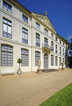 Main portal with two hunter figures, summer palace and park, residential town of Greiz, Thuringia,