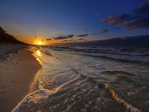 Sunset on a sandy beach on the island of Usedom on the Baltic Sea, Zempin, Mecklenburg-Western