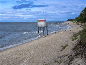 DLRG stand on the beach, sandy beach, clouds in the blue sky on the island of Usedom on the Baltic