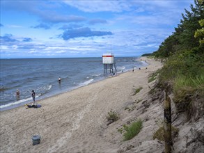 DLRG stand on the beach, sandy beach, clouds in the blue sky on the island of Usedom on the Baltic