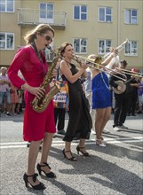 Jazz musicians, The Carling family, play on the street in Ystad in the opening of the Ystad Jazz