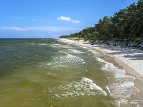 Sandy beach beach with clouds in the blue sky on the island of Usedom on the Baltic Sea, Zempin,