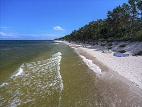 Sandy beach beach with clouds in the blue sky on the island of Usedom on the Baltic Sea, Zempin,