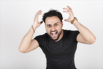 Latin young man arguing loudly