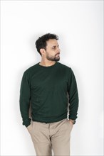 Portrait of a latin man looking to the side. White background