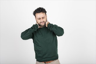 Young latin man with neck pain