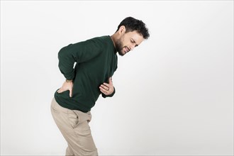 Young latin man with waist pain