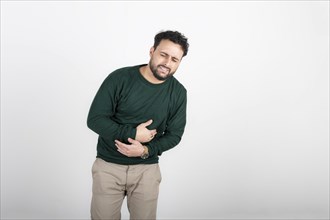 Man with stomach ache on white background