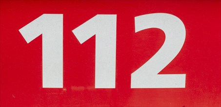 Emergency call 112 sign for the fire brigade on an ambulance, Germany, Europe