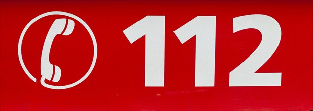 Emergency call 112 sign for the fire brigade on an ambulance, Germany, Europe