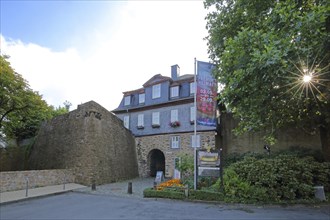 Gatehouse with backlight with flag, Siegerland Museum, inscription, Upper Castle built 14th