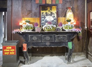 Altar decorated with bananas and flowers in the Hmong royal palace, Sa Phin, Ha Giang province,