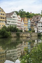 City view, Neckar river front with historic buildings and colourful gables, Tübingen,