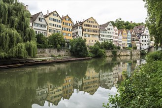 City view, Neckar river front with historic buildings and colourful gables, Tübingen,