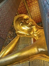 Close-up of the Reclining Buddha statue, Wat Pho complex, Bangkok, Thailand, Asia