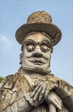 Chinese stone doll, Gate gaurdian at Wat Pho complex, Bangkok, Thailand, Asia