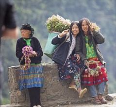 Vietnamese woman selling flowers in the northern mountains, Ha Giang province, Vietnam, Asia