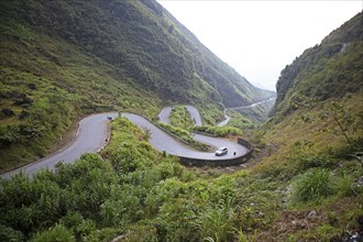 Winding road through the northern mountain landscape, Ha Giang province, Vietnam, Asia