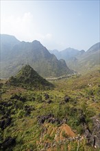 Road through the northern mountain landscape, Ha Giang province, Vietnam, Asia