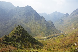 Road through the northern mountain landscape, Ha Giang province, Vietnam, Asia