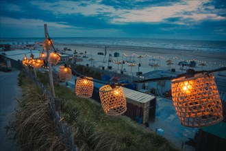 String of lights on the beach at blue hour, Zandvoort, Netherlands