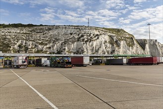 Trucks waiting in the ferry terminal, chalk cliffs, Dover, Kent, England, United Kingdom, Europe