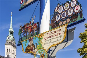 Church of St Peter and Writing Munich Beer Purity Law on the Maypole at Viktualienmarkt, Munich,