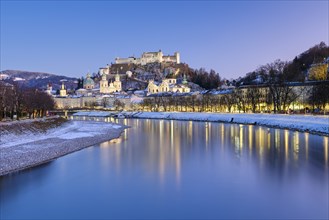 Salzburg in winter at the blue hour, Old Town, Cathedral, Fortress Hohen Salzburg, Salzach,