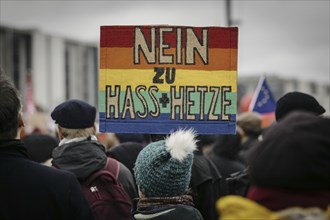 Posters at the large demonstration against the right in Berlin under the slogan We are the firewall