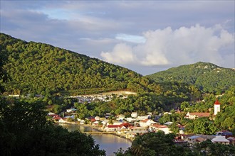 Caribbean, French Antilles, Guadeloupe, Basse-Terre, View of the village Deshaies with harbour,