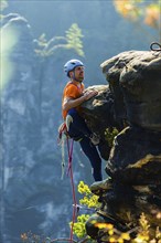 Climbers in Rathen in Saxon Switzerland