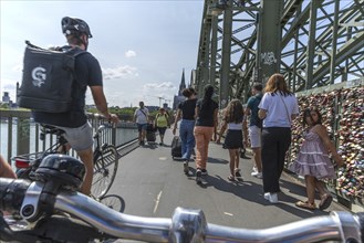 Cycling from a first-person perspective on a shared footpath and cycle path over the Hohenzollern