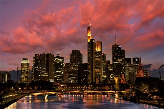 Skyline and banking district against a dramatic cloudy sky, sunset, Taunus Tower, Tower 185,