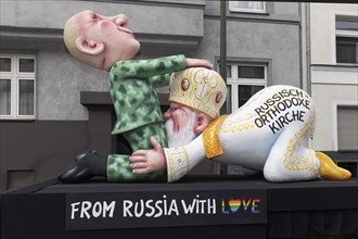 Patriarch Cyril of the Russian Orthodox Church having oral sex with Vladimir Putin, satirical float