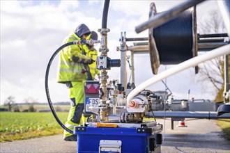 Detailed view of a machine with hoses and valves on a blue crate, fibreglass construction, Nagold,