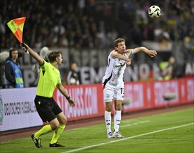 Throw-in action Thomas Müller GER (13) Linesman shows flag, Max-Morlock-Stadion, Nuremberg,