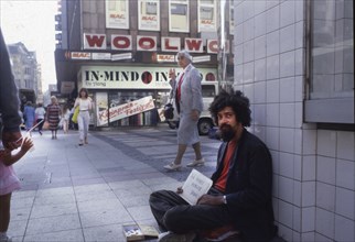 DEU, Germany: The historical slides from the 80-90s, Dortmund. Beggars in the city centre. 1984-5