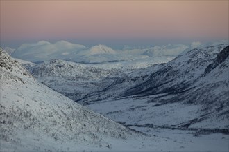 Mountain landscape near Tromso, Norway, twilight, snow, winter, Europe