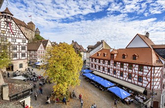 Square at the TiergÃ¤rtnertor with half-timbered houses, Pilatus House, at the Kaiserburg, in