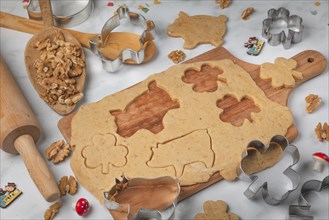 Biscuit baking, cutting out biscuits for New Year, shamrocks and pigs, baking accessories