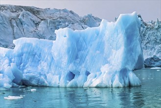 Iceberg by an arctic glacier, Svalbard, Norway, Europe