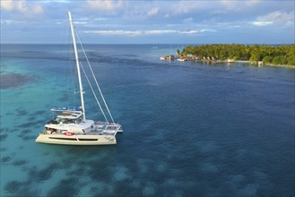 Aerial view, diving ship Aqua-Tiki III, catamaran, aft South Pass, South Channel and Tetamanu