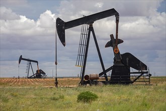 Plains, Texas, Oil wells on farm land in the Permian Basin