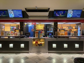 Interior shot kiosk, point of sale in a cinema, food, popcorn, nachos, drinks, Stuttgart,