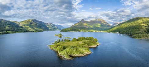 Aerial panorama of the western part of Loch Leven with the historic island of Eilean Munde, above